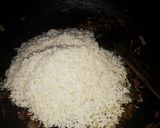 A picture of step 4 of Lemon prawn rice.
