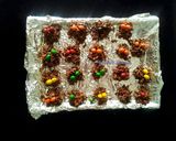 A picture of step 4 of Chocolate noodles  spiders.