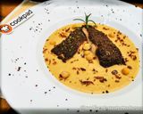 Foto del passaggio 6 della ricetta Filetti di Trota al Forno con Ceci, Radicchio e Granella di Missoltino