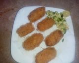 A picture of step 4 of Crispy Potatoes with stuffed rice.