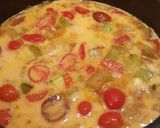 Une image de l'étape 3 de Omelette aux courgettes et tomates.
