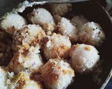 A picture of step 11 of Suji coconut balls.