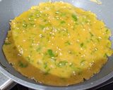 A picture of step 4 of Egg Paratha With Liquid Dough.