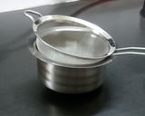 A picture of step 1 of Bhapa doi (steamed yoghurt pudding).
