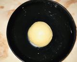 A picture of step 15 of Bow tie bun.