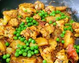 A picture of step 5 of Aloo Gobhi Matar/ Potato Cauliflower Green Peas Dry Curry.