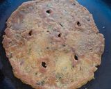 A picture of step 4 of Arrowroot mix thalipeeth with white butter.