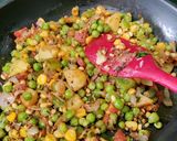 A picture of step 3 of Red Poha Masala With Veggies, Sprouts and Nuts.