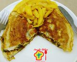 A picture of step 8 of Veggies omelette with fried potatoes.