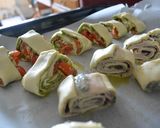 Foto del paso 5 de la receta Rollitos de hojaldre: tomates cherry con pesto y roquefort