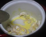 Foto del paso 1 de la receta: Calabacín relleno de puré con gambas y jamón