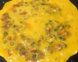 A picture of step 9 of Tawa omelete.