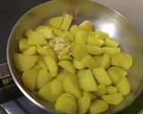 A picture of step 3 of Cheese & bacon potatoes.