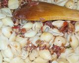 A picture of step 11 of Chicken Masala Pasta.