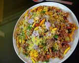 A picture of step 4 of Ragi Puffs Bhel.