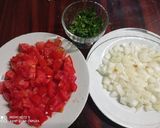 Foto del paso 1 de la receta: Revuelto de tomates y cebolla