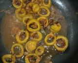 A picture of step 5 of Onion and bitter gourd karela sabji.