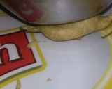 A picture of step 5 of Masaly bhari hari mirch k pakoray.