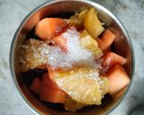 A picture of step 1 of Papaya Pina punch.