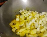 A picture of step 2 of Raw papaya fry.