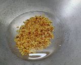 A picture of step 2 of Red Amaranth Dry Curry.