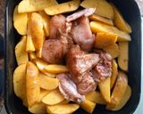 A picture of step 2 of Baked Irish Potatoes and peppered chicken.