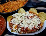 A picture of step 5 of Mexican rice pulao.