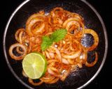 A picture of step 6 of Laccha Onion Salad.