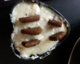 A picture of step 6 of Mariegold biscuits  cake.