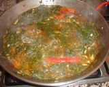 Foto del paso 7 de la receta Paella de espinacas y calamares