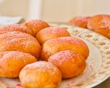 Une image de l'étape 10 de Beignets fourrés à la crèmes pâtissière et saupoudrés de pralines roses.