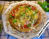 A picture of step 3 of Hash brown pizza in Pan:.