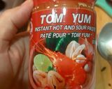 A picture of step 3 of Thai Chicken Tom yum soup.