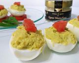 A picture of step 7 of Deviled Eggs with Manchego Cheese Spread and Avocado.
