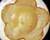 A picture of step 8 of Appam with coconut milk.