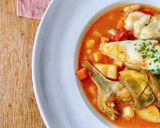 Une image de l'étape 7 de Bacalao con alcachofas i alubias.