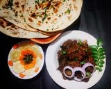 A picture of step 8 of Mangalorean style ghee roast chicken.
