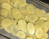 Foto del paso 1 de la receta: Panga al horno con patatas panaderas, pimiento rojo y cebolla