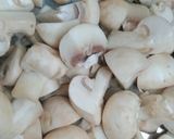 A picture of step 1 of Achari Mushroom.