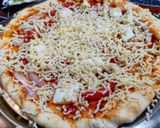 A picture of step 2 of Paneer and onion pizza.