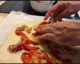 A picture of step 2 of Coca de Escalivada with Anchovies.