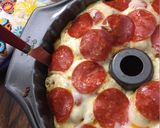 A picture of step 7 of Pizza monkey bread.