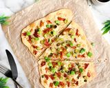 A picture of step 6 of Spring onion and prosciutto flatbread.
