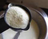 A picture of step 15 of Orange Rasmalai/ Khatti Mitti Paneer Bahar.