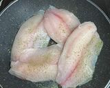 A picture of step 2 of Fish with Green Beans and Rice.