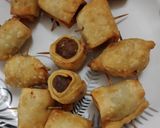 A picture of step 6 of Roll chicken kola.