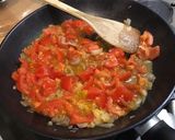 Une image de l'étape 8 de Noix de saint Jacques aux tomates, échalotes, ail et persil.
