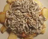 Foto del paso 5 de la receta Huevos rotos con patatas y gulas del norte