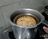 A picture of step 13 of Eggless Rava Cake In Cooker.