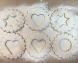Foto del paso 7 de la receta: Galletas de mantequilla con mermelada de frambuesa